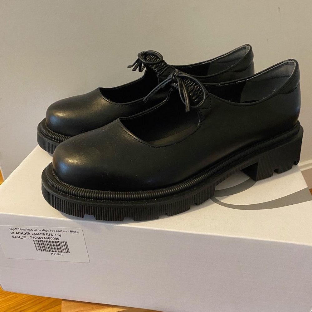 Black faux leather lug sole mary janes with bowtie, new w/box, size 7.5.